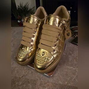 Kurt Geiger London Southbank Tag Platform Sneakers in metallic gold.  Size 42